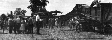 The Girl Boss of a threshing crew Image